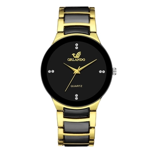 Elegant ORLANDO black and gold quartz watch with metallic strap and diamond markers