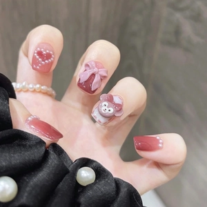 Press-on nail set with 3D bows pearls and Duffy bear design in reddish brown tones