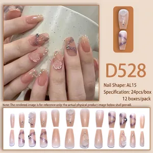 Nude pink gradient press-on nails with 3D white camellia flowers and sparkling rhinestones
