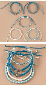 Detail of blue and white beaded turtle bracelets with wave charms and woven textures