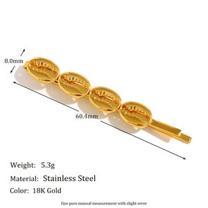 Close-up of 18K gold plated stainless steel sea snail hair clip with size dimensions
