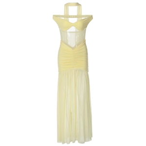 Detail of sheer mesh patchwork and ruched waist on a pale yellow bodycon dress