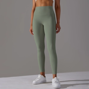 Detailed view of sage green high-waisted seamless yoga pants with elastic waistband