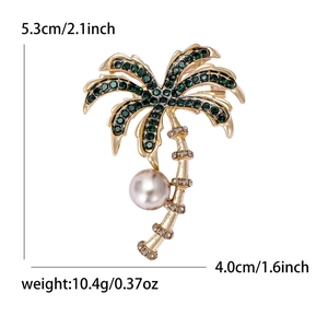Golden coconut tree brooch with green rhinestones and pearl detail for women