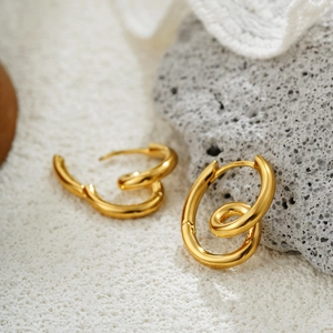 Elegant 18K gold intertwined double hoop earrings in a minimalist modern design