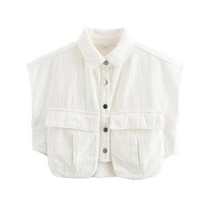 Close-up of white cropped utility vest with lapel collar and flap pockets detail