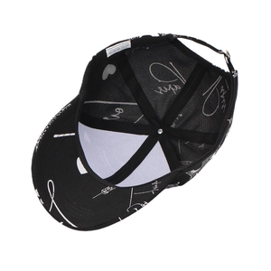 Detail view showing 100% polyester material and interior sweatband of the graffiti baseball cap