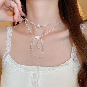 Double-layered beaded choker necklace with pearl heart bow pendant and square white beads