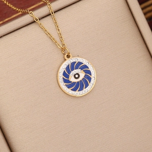 Golden stainless steel evil eye pendant necklace with blue enamel and sparkling crystals
