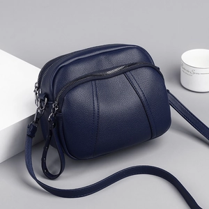 Borsa a tracolla in pelle PU blu scuro con cerniere multiple e trama a litchi donna