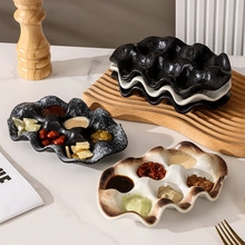 Irregular ceramic seasoning dishes and snack plates in speckled black and white ceramic