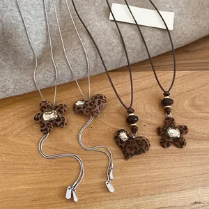 Leopard print heart and flower pendant necklaces with sparkling rhinestones and chains