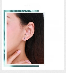 Close-up of model wearing S925 silver long bar earrings with colorful zircon stones