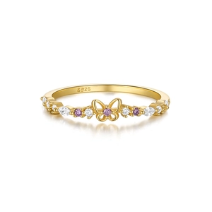 Macro shot of S925 silver golden butterfly ring with purple and white zircon stones