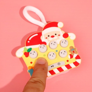 Christmas themed electronic pop light game console with Santa and gingerbread design