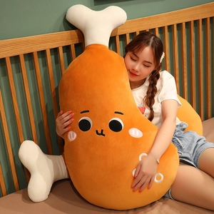 Large soft cartoon chicken leg plush pillow being held by an Asian model in a bedroom