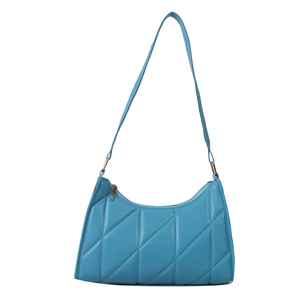 Quilted blue underarm bag with gold zipper and textured diagonal stitching detail