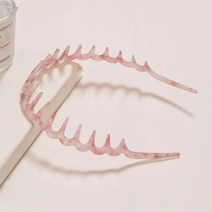 Pink marble texture wavy headband with non-slip teeth for secure hair styling