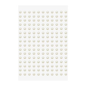 Macro shot of white round adhesive pearl stickers organized neatly on a white background