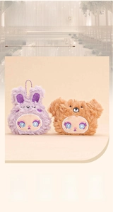 Detail of plush animal pendants with embroidered facial features and purple metal chains