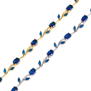 Luxury vine bracelet with cubic zirconia and blue stones in gold and silver plating