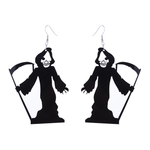 Macro view of black acrylic Grim Reaper silhouette earrings for Halloween festival