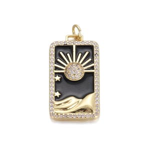 Macro view of rectangular black enamel evil eye pendant with gold plating and zircon stones