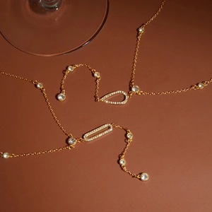 Elegant gold stainless steel Y-necklace with rhinestone teardrop and rectangle hollow charms
