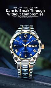 Detail of blue sunray dial with gold Roman numerals and dual calendar on steel watch