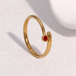 Minimalist 18k gold plated stainless steel open ring with a tiny red enamel drop detail
