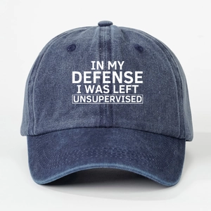 Detailed front view of navy washed denim baseball cap with white slogan print