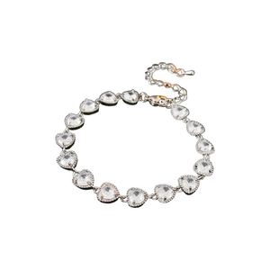 Elegant silver heart bracelet featuring clear cubic zirconia stones and adjustable clasp