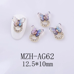 Iridescent glass butterfly nail art charm with rhinestones measuring 12.5x10mm