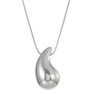 Macro shot of liquid teardrop pendant in polished silver finish with high glossy reflection
