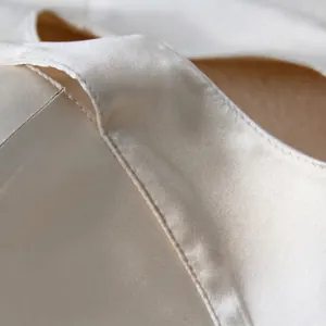3D pure silk sun protection face mask with smooth satin texture in creamy white