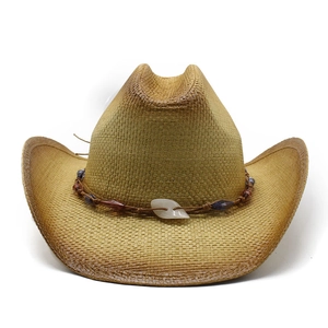 Tan woven straw western cowboy hat with beaded band and shell pendant on white background