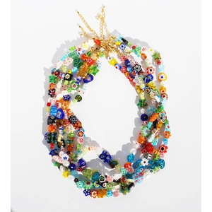 Colorful handmade floral glass bead necklace with gold clasp on white background