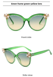 Detail of green cat-eye sunglasses with white rhinestones and pearl floral accents