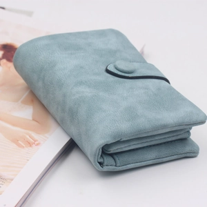 Detail of teal matte PU leather foldable short wallet with snap button closure