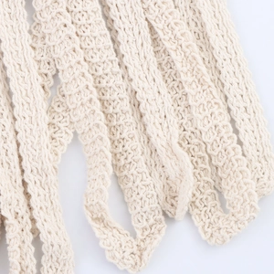 Falda de playa bohemia de ganchillo beige con flecos de algodón hechos a mano