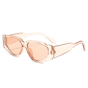 Fashionable geometric cat eye sunglasses with peach transparent frames and gradient lenses