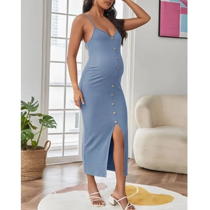Detailed close-up of blue knit maternity dress featuring front buttons and split hem