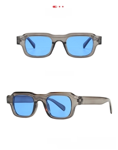 Front and side views of square grey translucent sunglasses with bright blue lenses