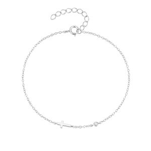 Macro view of a 925 sterling silver cross bracelet with a small diamond charm and O-chain