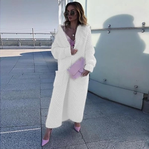 Chic white long knit cardigan with wide lapel and long sleeves for women street style