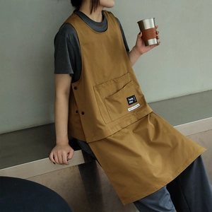 Brown canvas work apron with side buttons and front pockets for baristas and chefs