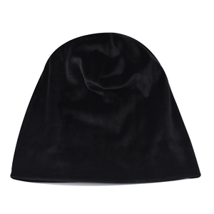 Detail view of the smooth black silk satin lining inside the warm knitted winter hat