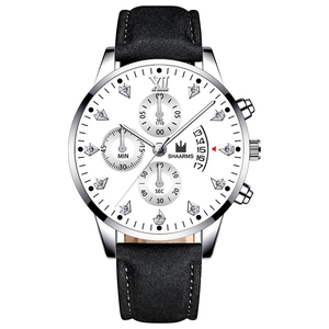 Detail of SHAARMS quartz watch with white dial, Roman numerals and calendar display