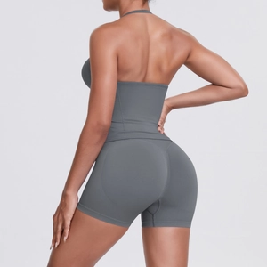 Detail of dark grey seamless yoga set showing racerback top and high waist lifting shorts