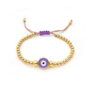 Golden beaded evil eye bracelet with purple pendant and adjustable braided cord